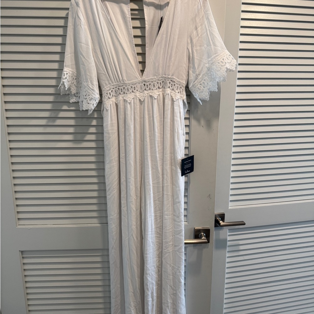 Elegant White Jumpsuit with Lace Details